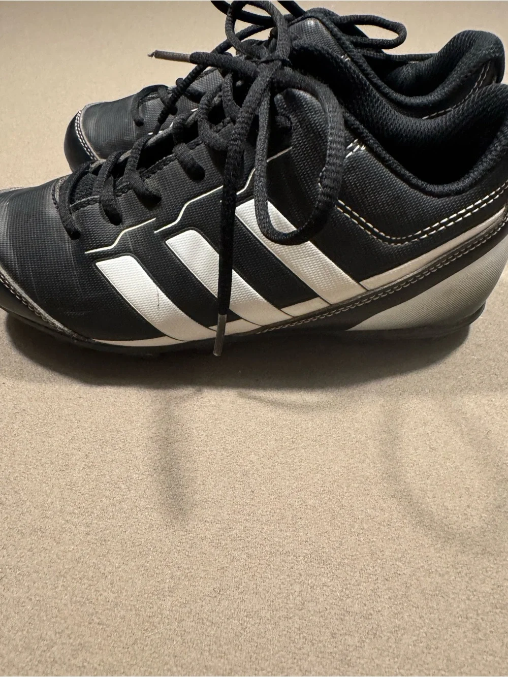 adidas boys  Black Athletic Cleats with White Stripes size 2